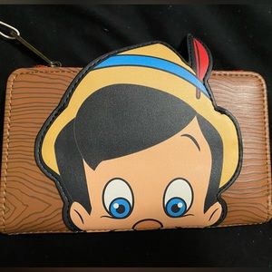 Loungefly Pinocchio wallet , brand new with tags